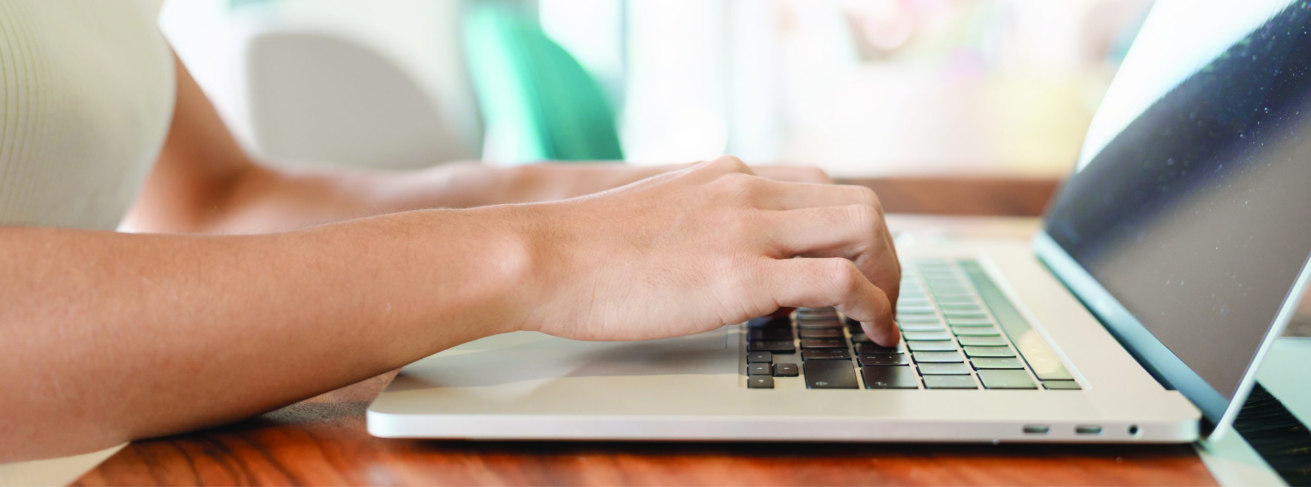 person typing on computer