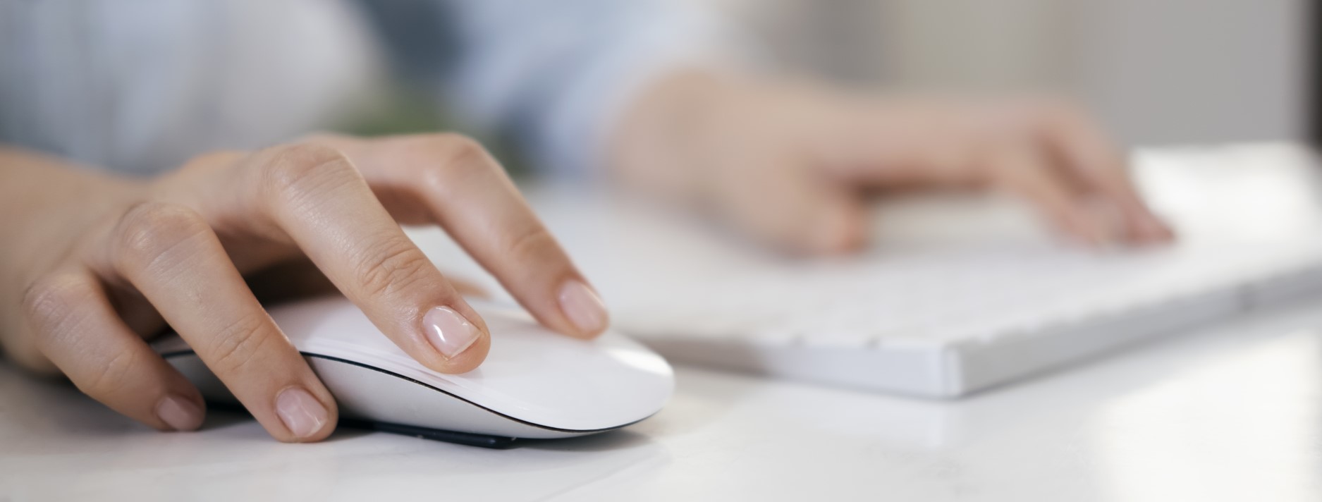 Person clicking around with mouse